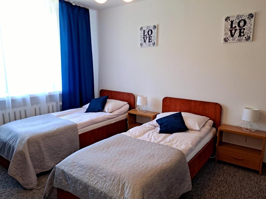 Postel nebo postele na pokoji v ubytování Willa "Zimowit" w Wiśle