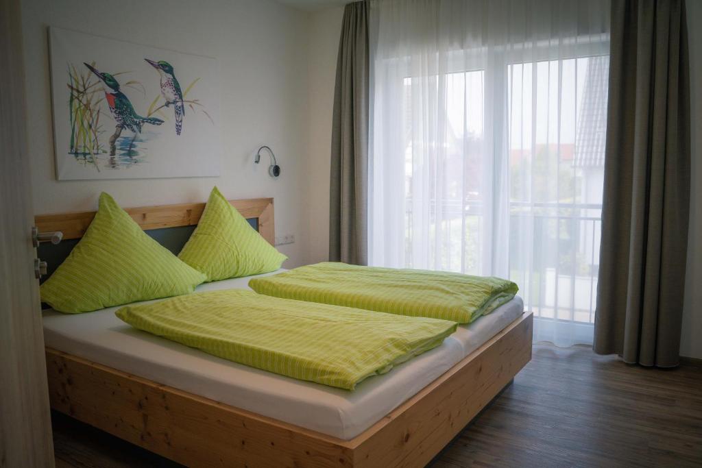 Postel nebo postele na pokoji v ubytování Pension Yvonne - SUPERIOR