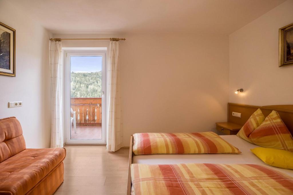 Posteľ alebo postele v izbe v ubytovaní Ferienwohnung Gitschbergblick
