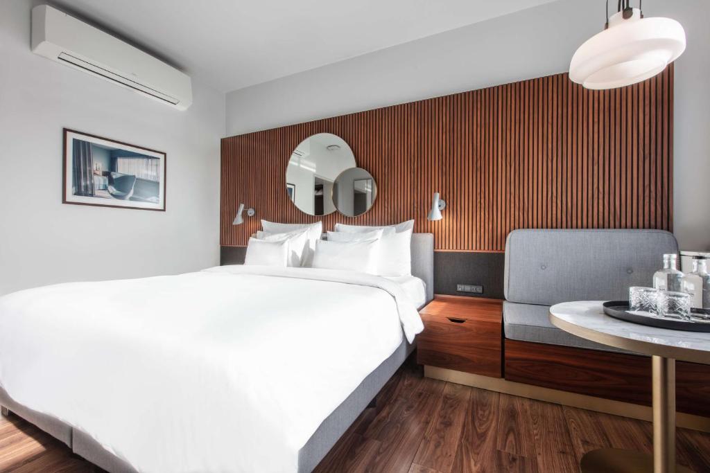 Postel nebo postele na pokoji v ubytování Radisson Collection Royal Hotel, Copenhagen