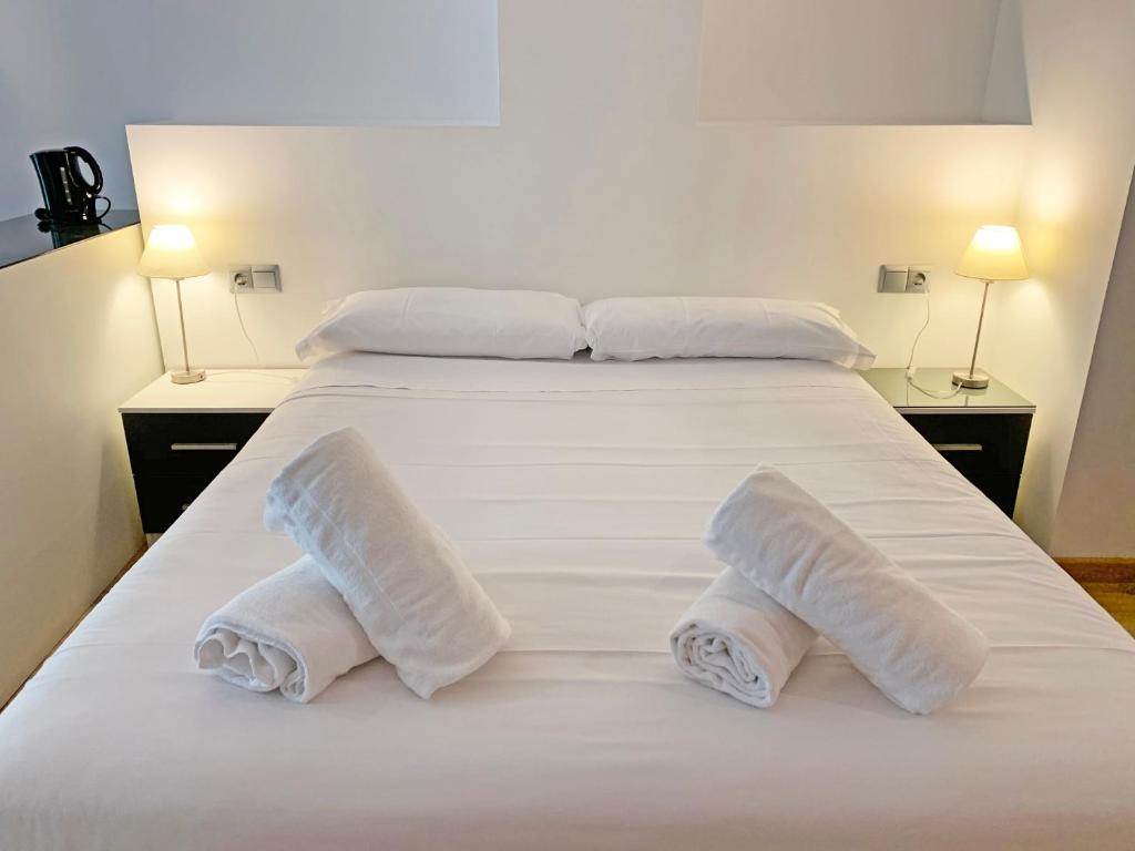 Postel nebo postele na pokoji v ubytování Apartamentos Vallnord 3000