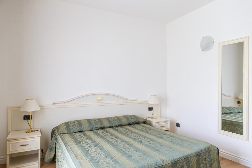 Postel nebo postele na pokoji v ubytování Hotel Villa Sofia