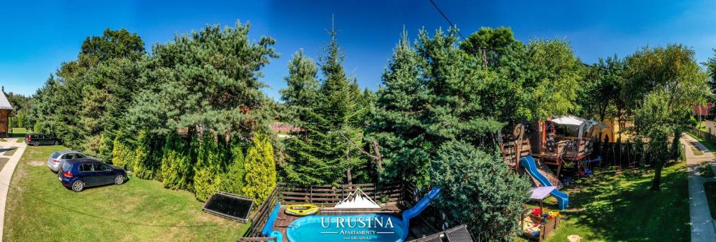 Vonkajšia záhrada v ubytovaní Apartamenty u Rusina