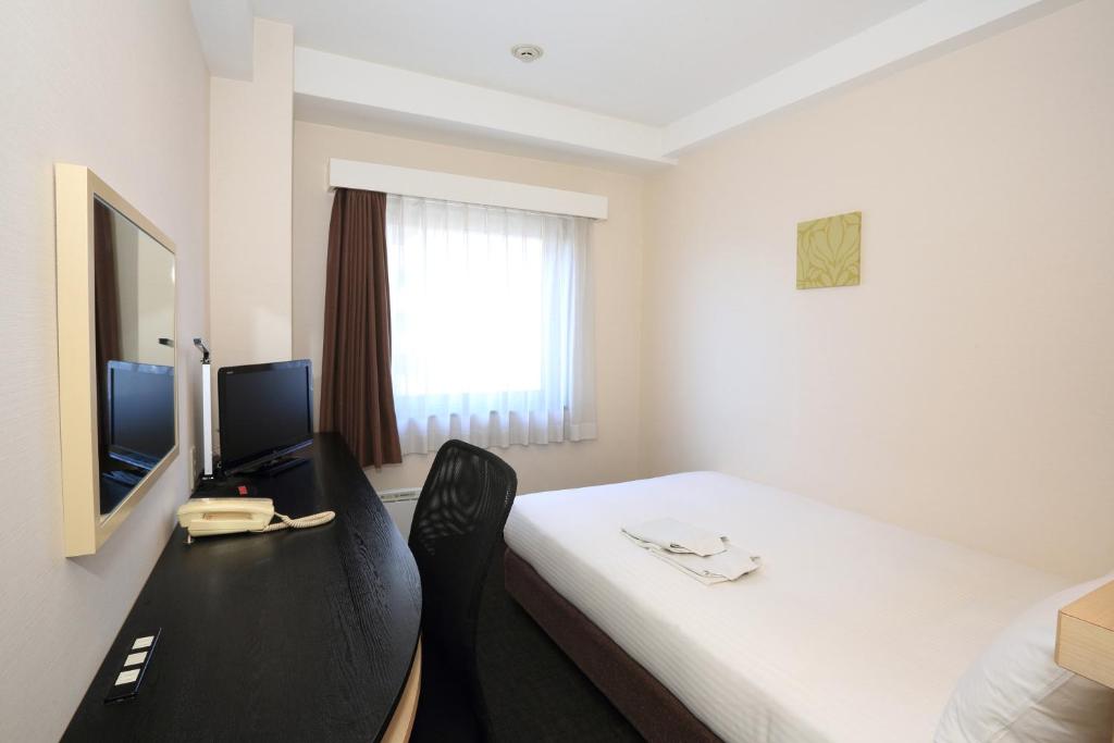 TV a/nebo společenská místnost v ubytování Smile Hotel Kyoto Shijo