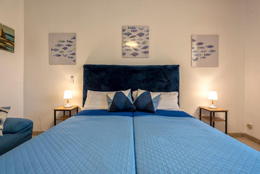A bed or beds in a room at Family house 1.1