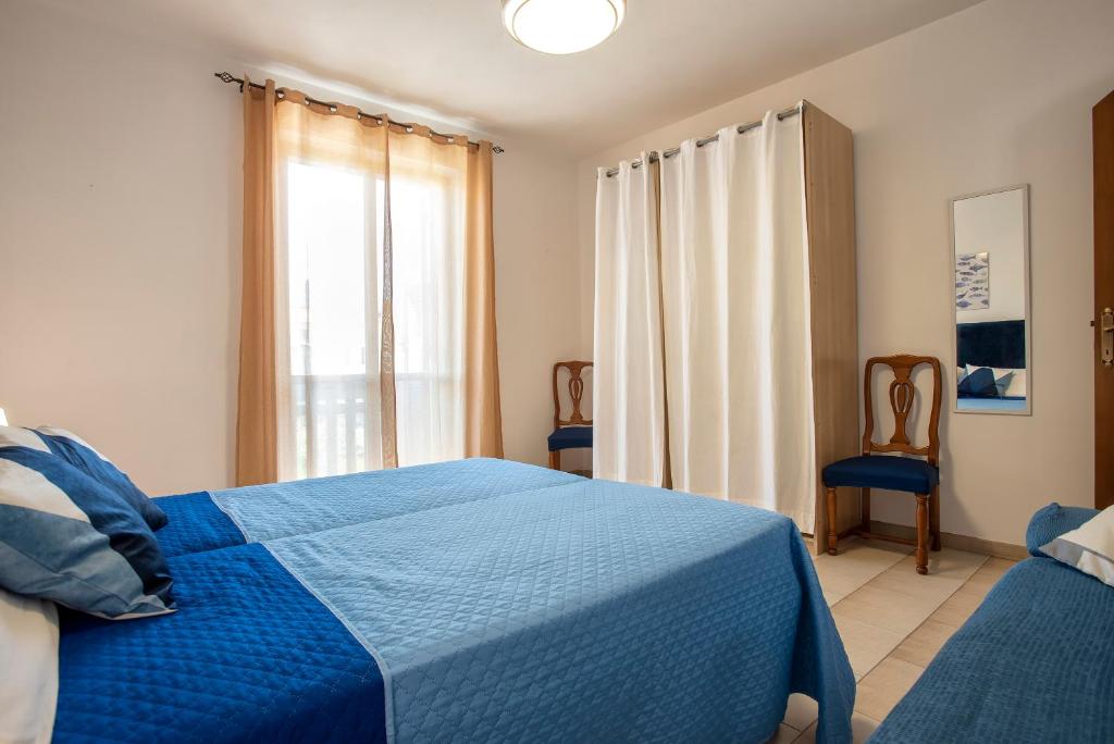 A bed or beds in a room at Family house 1.1