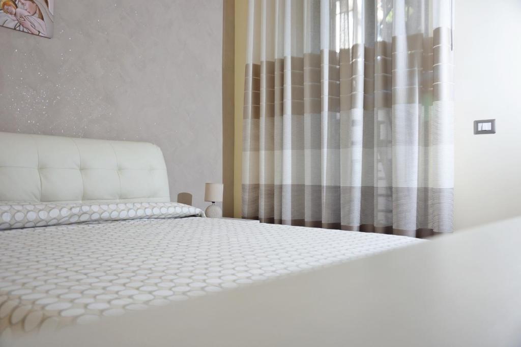 Postel nebo postele na pokoji v ubytování Sea Paradise