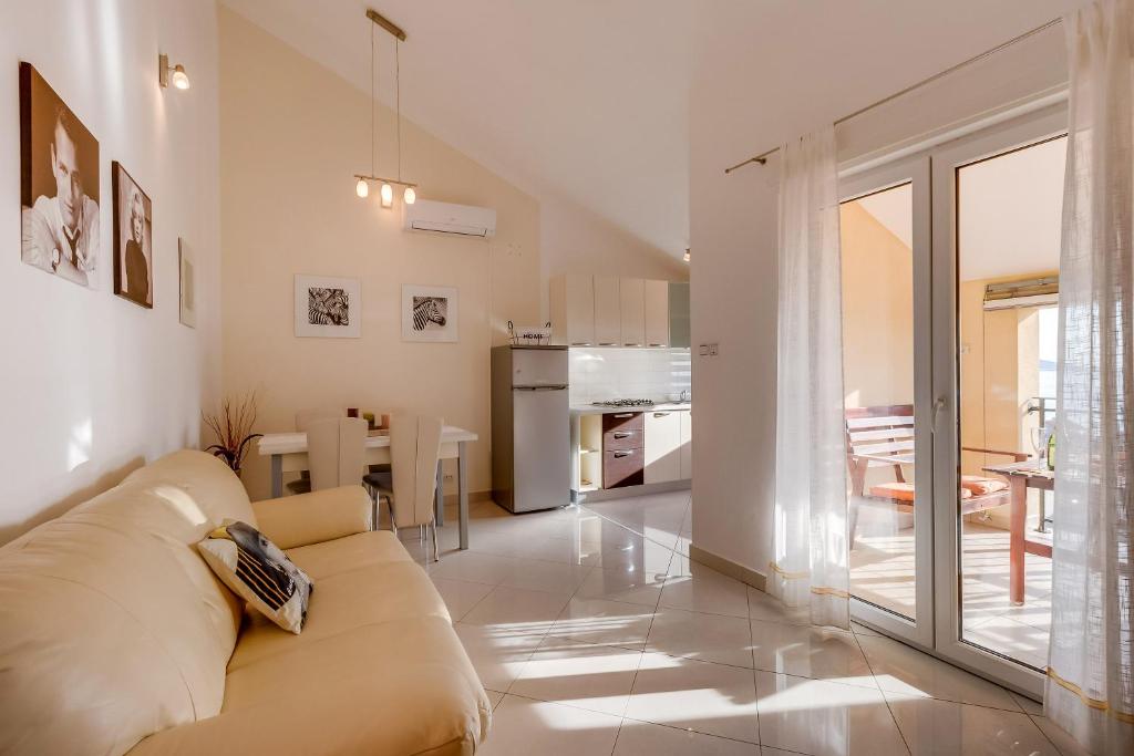 Kuchyň nebo kuchyňský kout v ubytování Apartmani Tanja