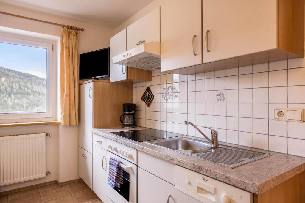 Kuchyň nebo kuchyňský kout v ubytování Ferienwohnung Gitschbergblick
