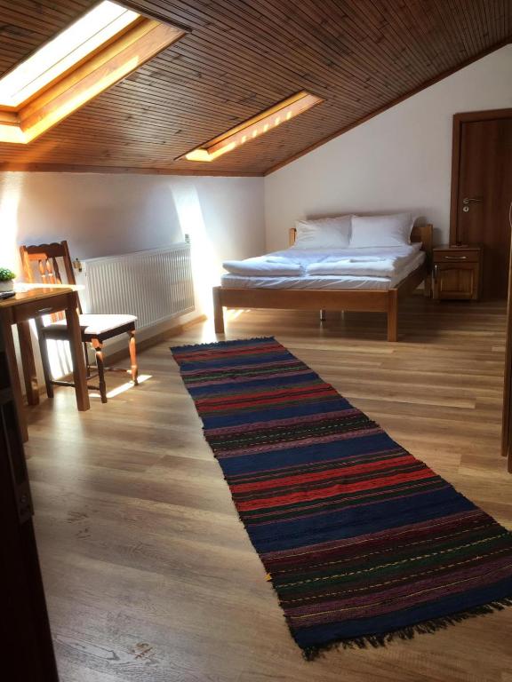Postel nebo postele na pokoji v ubytování Сининкова Къща