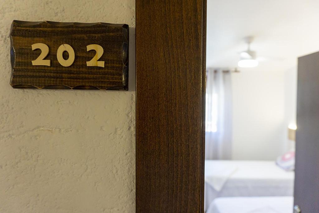 A bed or beds in a room at Alojamientos Rurales Entre Rocas