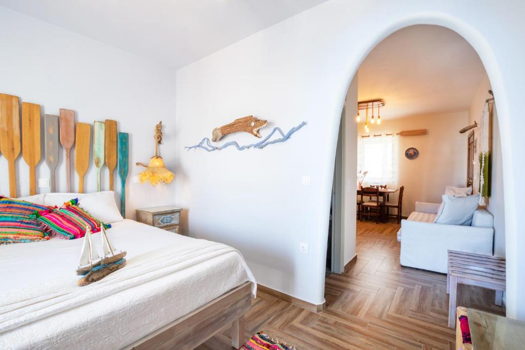 Postel nebo postele na pokoji v ubytování Gorgona Blue Apartments