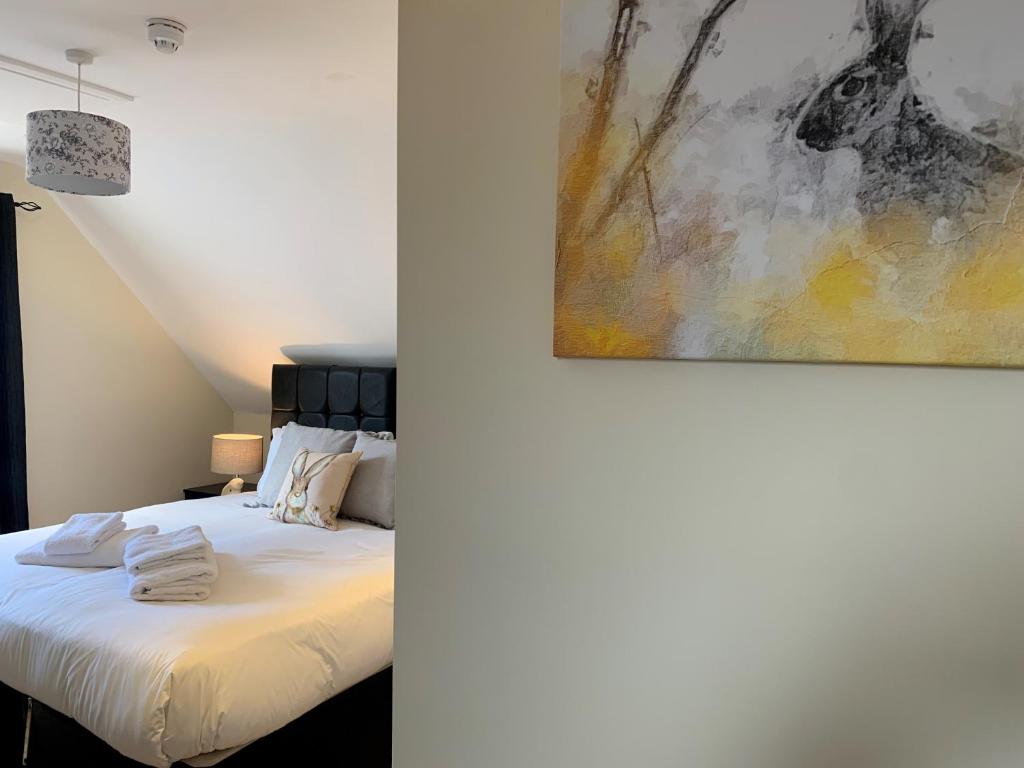 Postel nebo postele na pokoji v ubytování New Inn - Dorchester