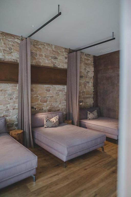 Voodi või voodid majutusasutuse Kunzmann's Hotel | Spa toas