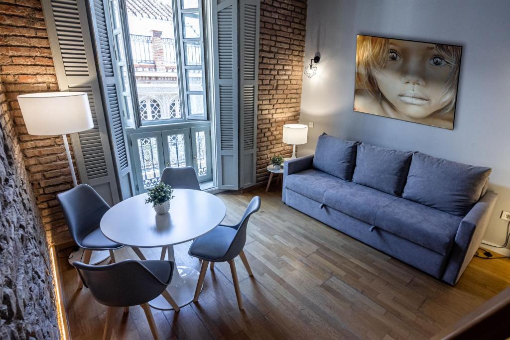 a living room with a couch and a table at Atlas in Málaga