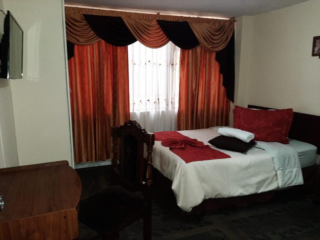 Postel nebo postele na pokoji v ubytování Hotel Bonaventure