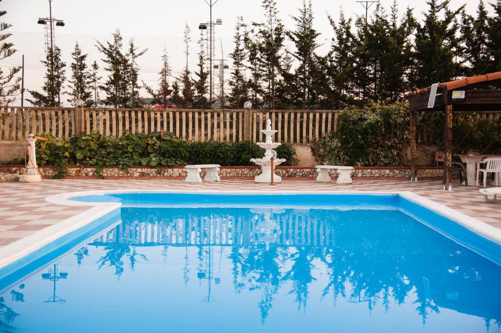 Bazén v ubytování templi la piscina nebo v jeho okolí