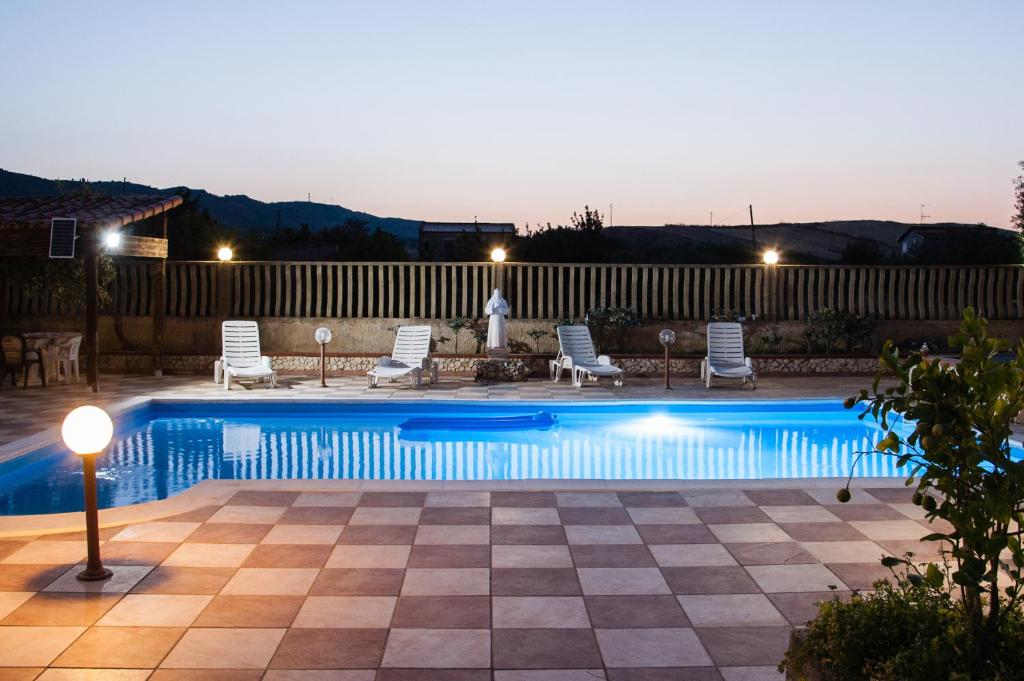 Bazén v ubytování templi la piscina nebo v jeho okolí