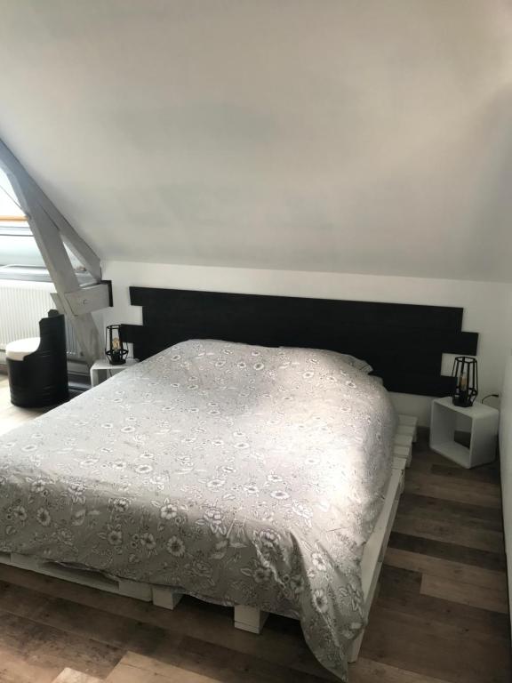 Postel nebo postele na pokoji v ubytování Chambre d'hôtes "COQUELICOT"