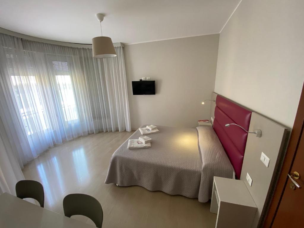 TV a/nebo společenská místnost v ubytování Hotel Due Giardini