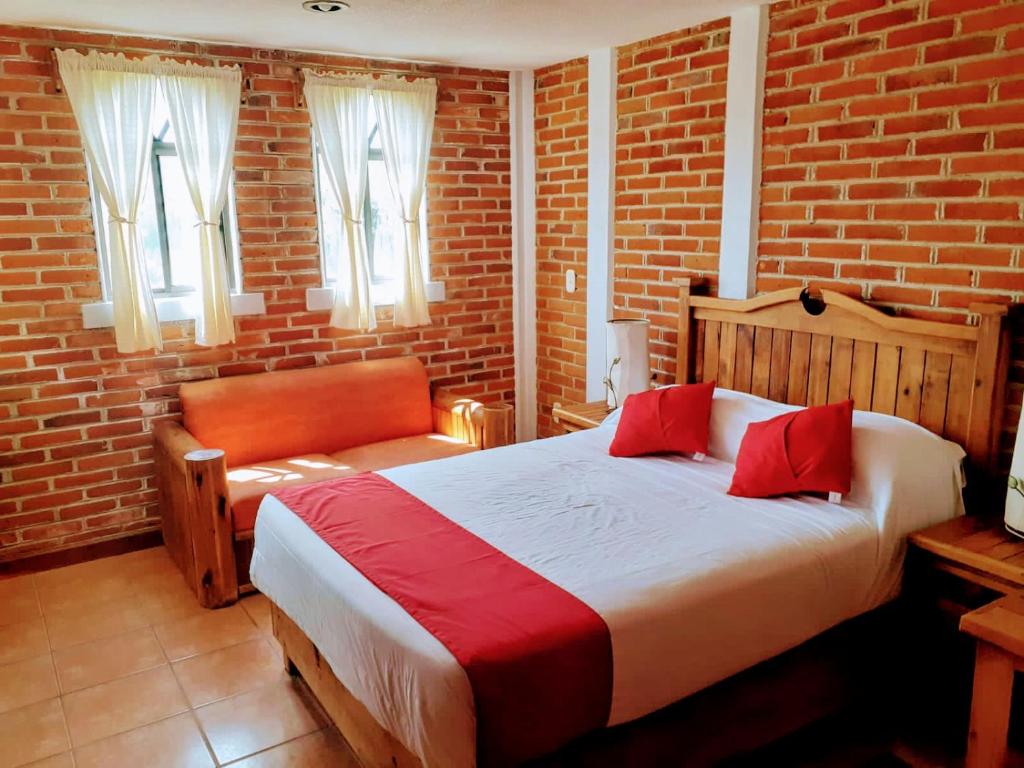 Postel nebo postele na pokoji v ubytování Hotel Bello Amanecer