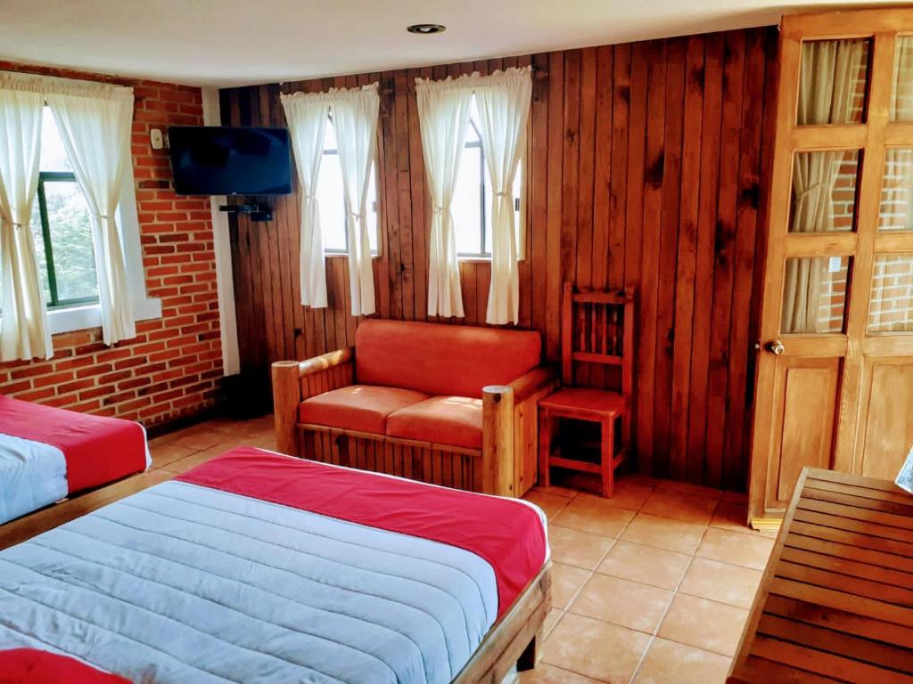 Postel nebo postele na pokoji v ubytování Hotel Bello Amanecer