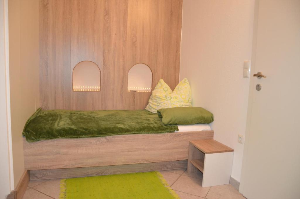 A bed or beds in a room at Ferienwohnung Vonwald