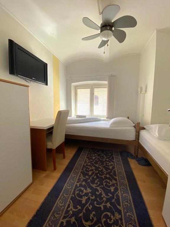 Postel nebo postele na pokoji v ubytování Guesthouse Kod Keme