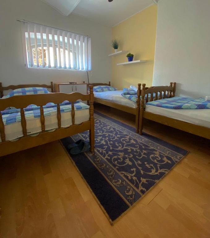 Postel nebo postele na pokoji v ubytování Guesthouse Kod Keme