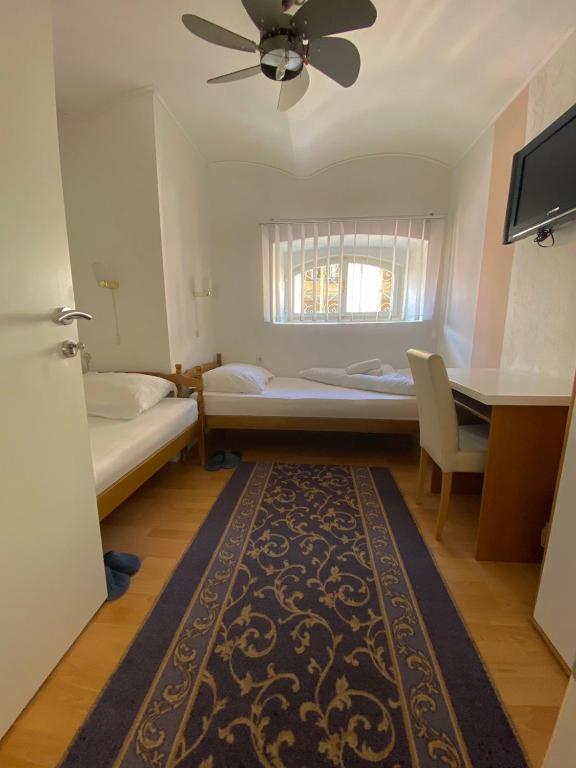 Postel nebo postele na pokoji v ubytování Guesthouse Kod Keme