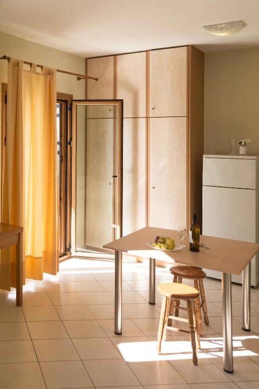 Kuchyň nebo kuchyňský kout v ubytování Eleni Suites Methoni