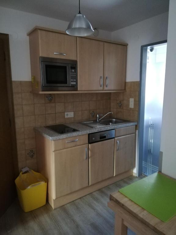 Kuchyň nebo kuchyňský kout v ubytování Haus Ortsblick