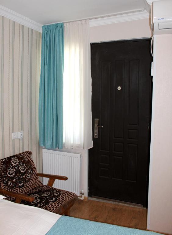 Postel nebo postele na pokoji v ubytování Guest House Old Tiflis 5