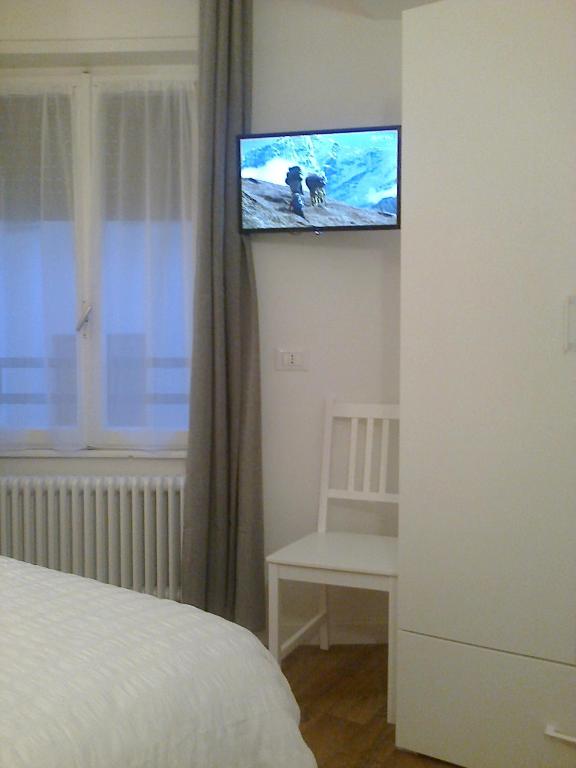 Telewizja i/lub zestaw kina domowego w obiekcie B&B The Secret Place