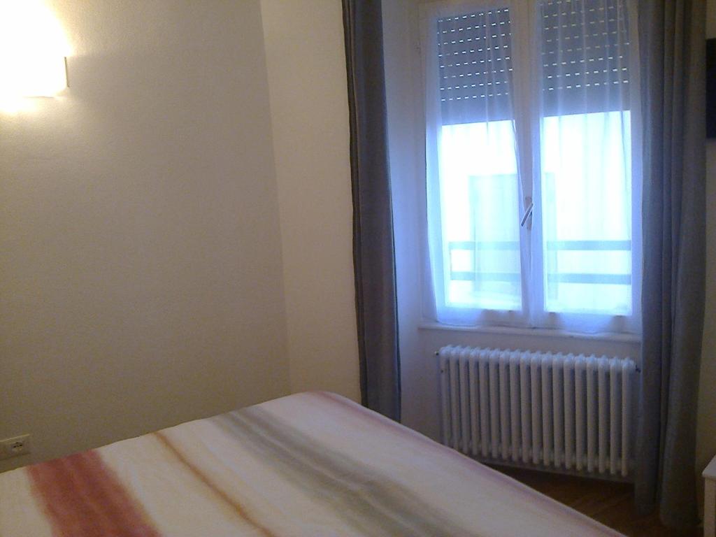 Łóżko lub łóżka w pokoju w obiekcie B&B The Secret Place