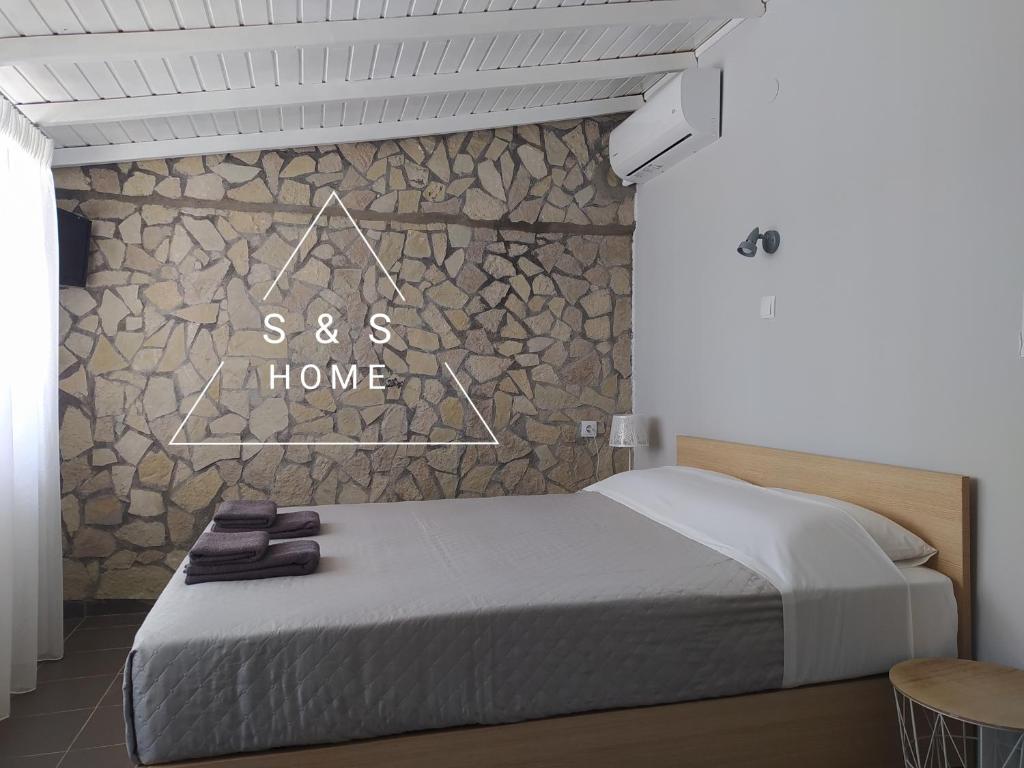 Posteľ alebo postele v izbe v ubytovaní S&S Home