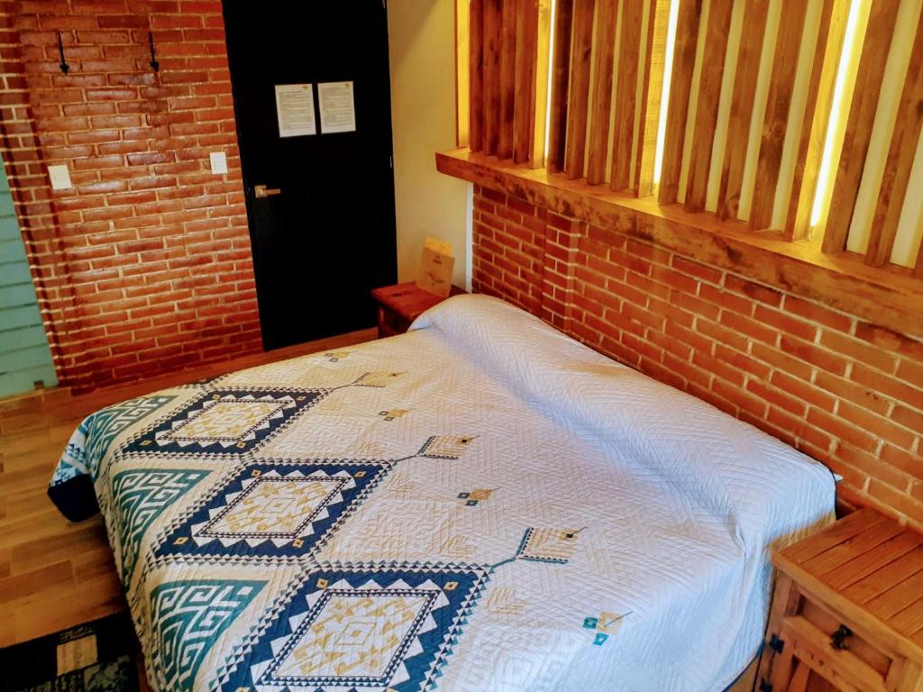 Postel nebo postele na pokoji v ubytování Hotel Bello Amanecer