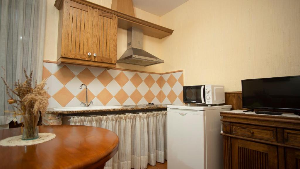 Kuchyň nebo kuchyňský kout v ubytování Casa Rural Santa Elena