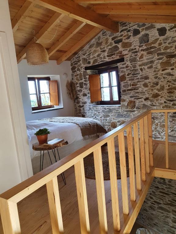 Postel nebo postele na pokoji v ubytování Casa do Ti Tóte