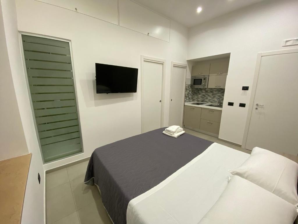 Posteľ alebo postele v izbe v ubytovaní Room25mq
