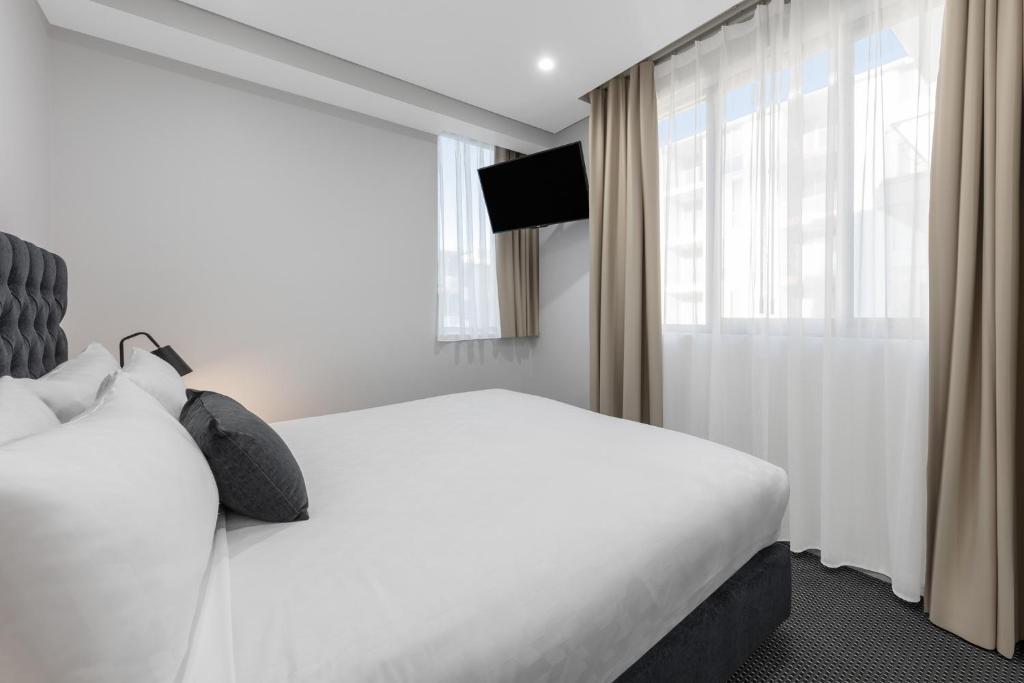 Meriton Suites North Ryde - Resim 9