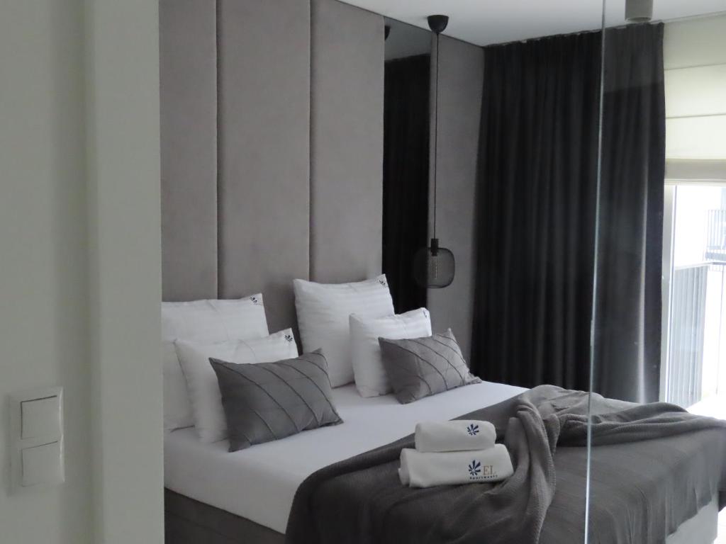 Postel nebo postele na pokoji v ubytování EL Apartments - Aries