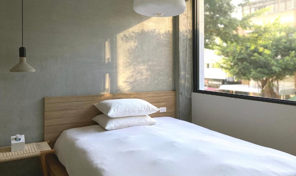 Postel nebo postele na pokoji v ubytování Little Inn by LAGOM