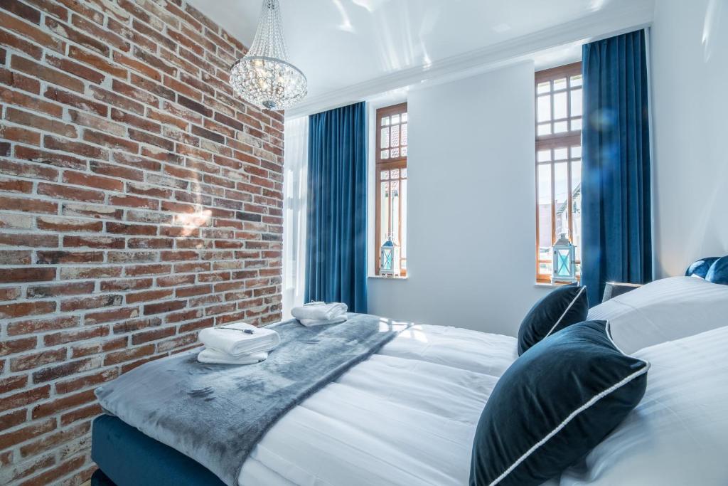 Lova arba lovos apgyvendinimo įstaigoje Apartament Royal Blue Ustka