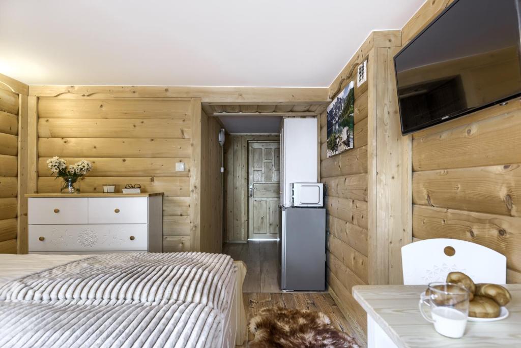 Posteľ alebo postele v izbe v ubytovaní Apartamenty VILLA SKI-BÓWKI