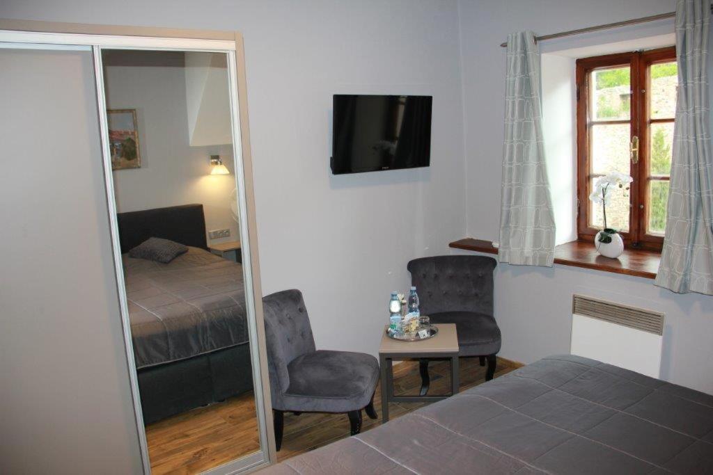 Postel nebo postele na pokoji v ubytování Hotel Gurman