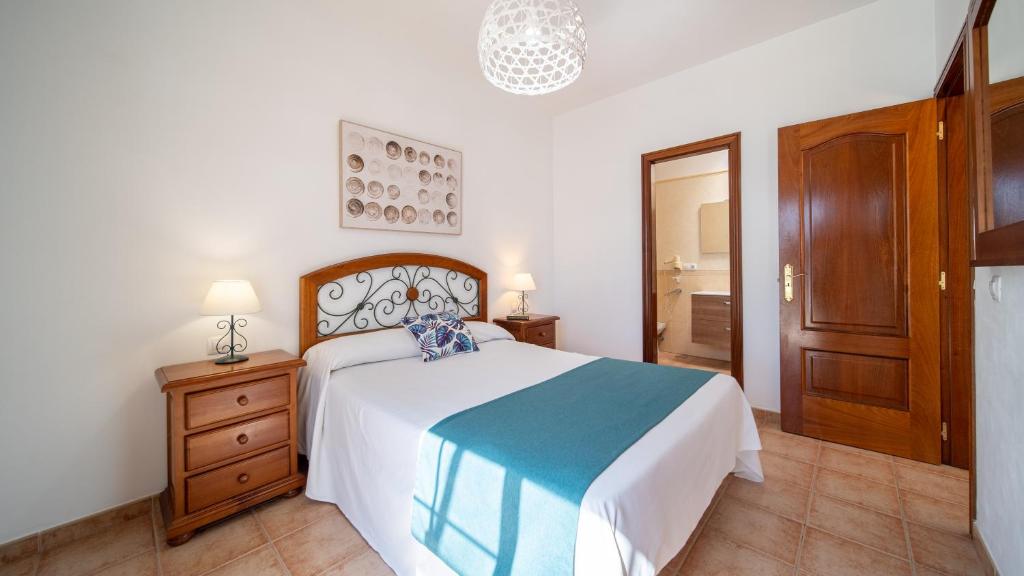 Postel nebo postele na pokoji v ubytování Villas Salinas de Matagorda