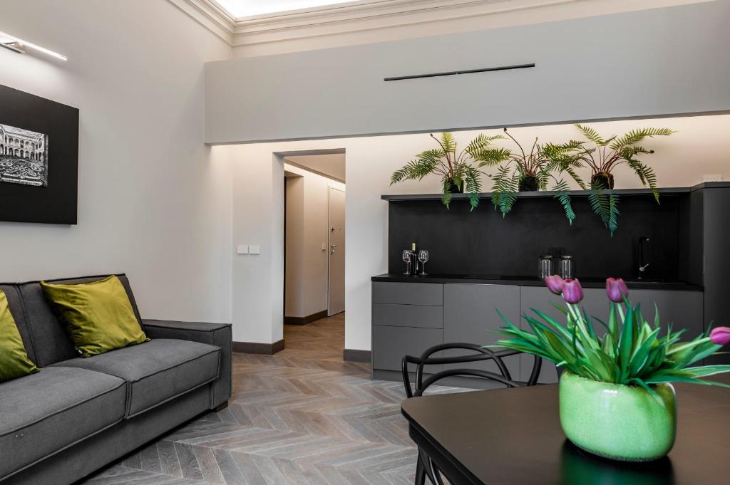 A seating area at Ferrini Home - Etnea Portrait