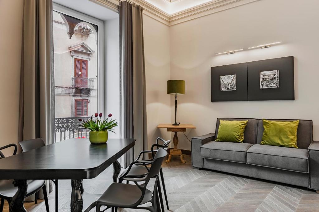 A seating area at Ferrini Home - Etnea Portrait