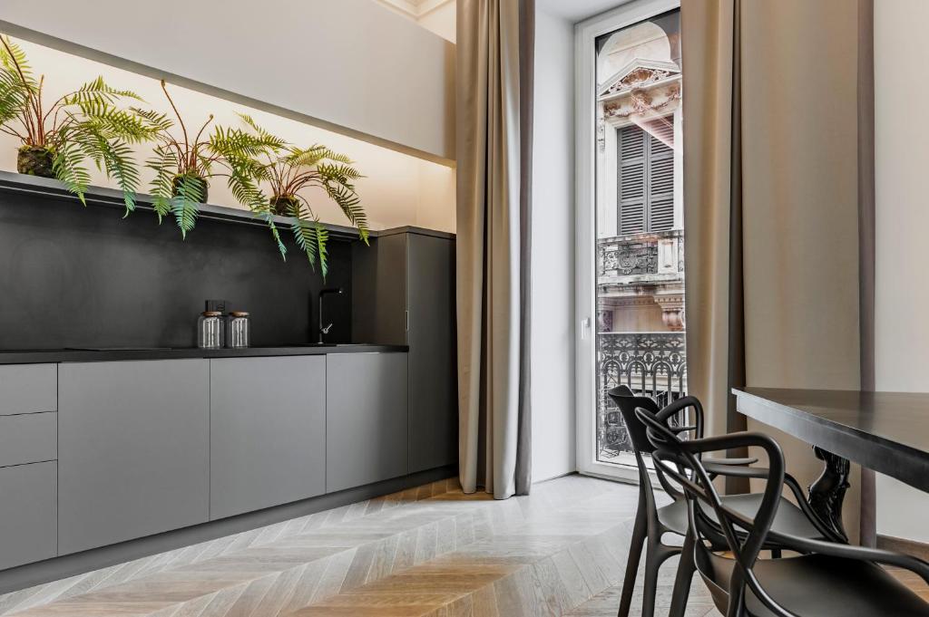 A kitchen or kitchenette at Ferrini Home - Etnea Portrait